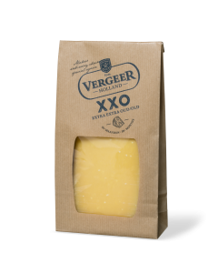 Gouda XXO cheese block in a paper bag